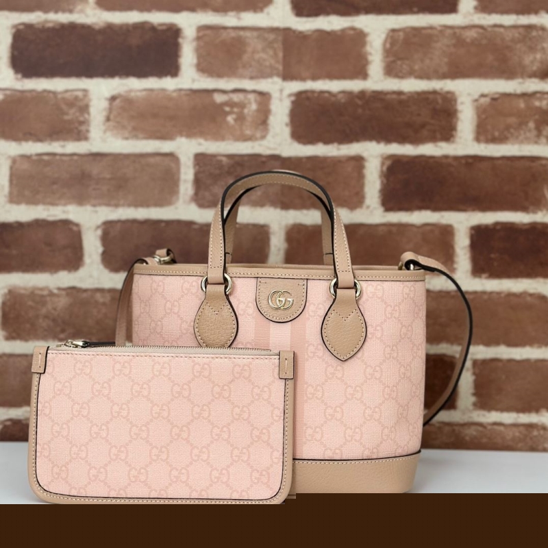 G*u*i shopping bags